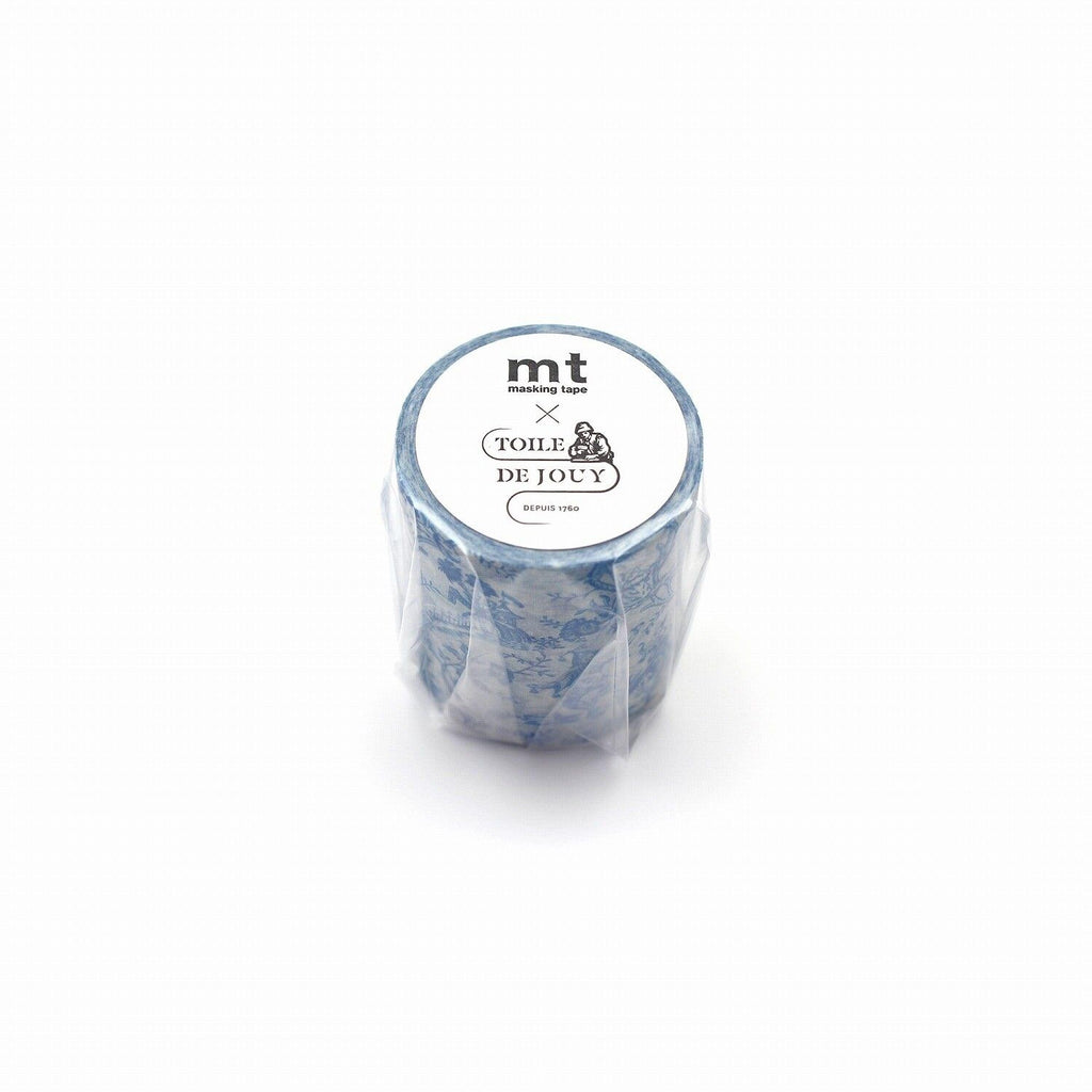 A blue and white patterned container with a label that reads "mt masking tape TOIL & DE JOUY" and "DEPUIS 1980".
