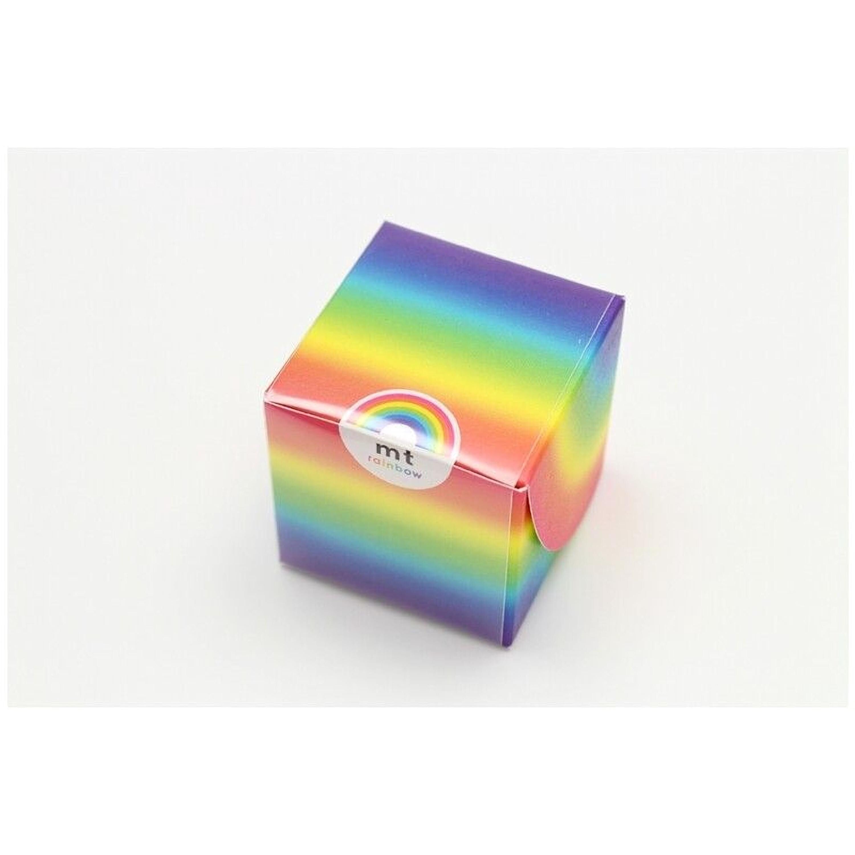 A colorful, rainbow-colored box with a white label on it.