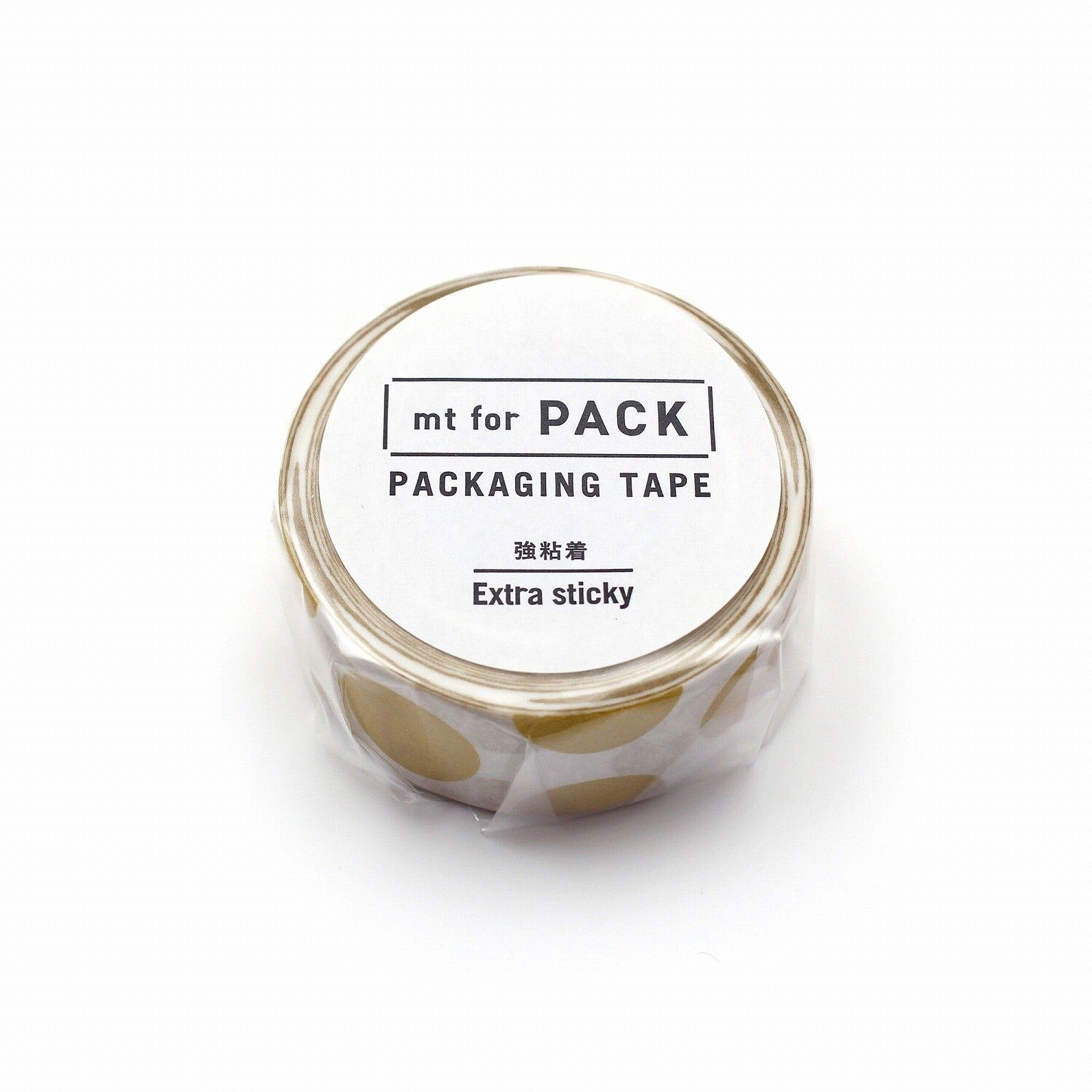 A cylindrical container of packaging tape with a label that reads "mt for PACK PACKAGING TAPE Extra sticky".