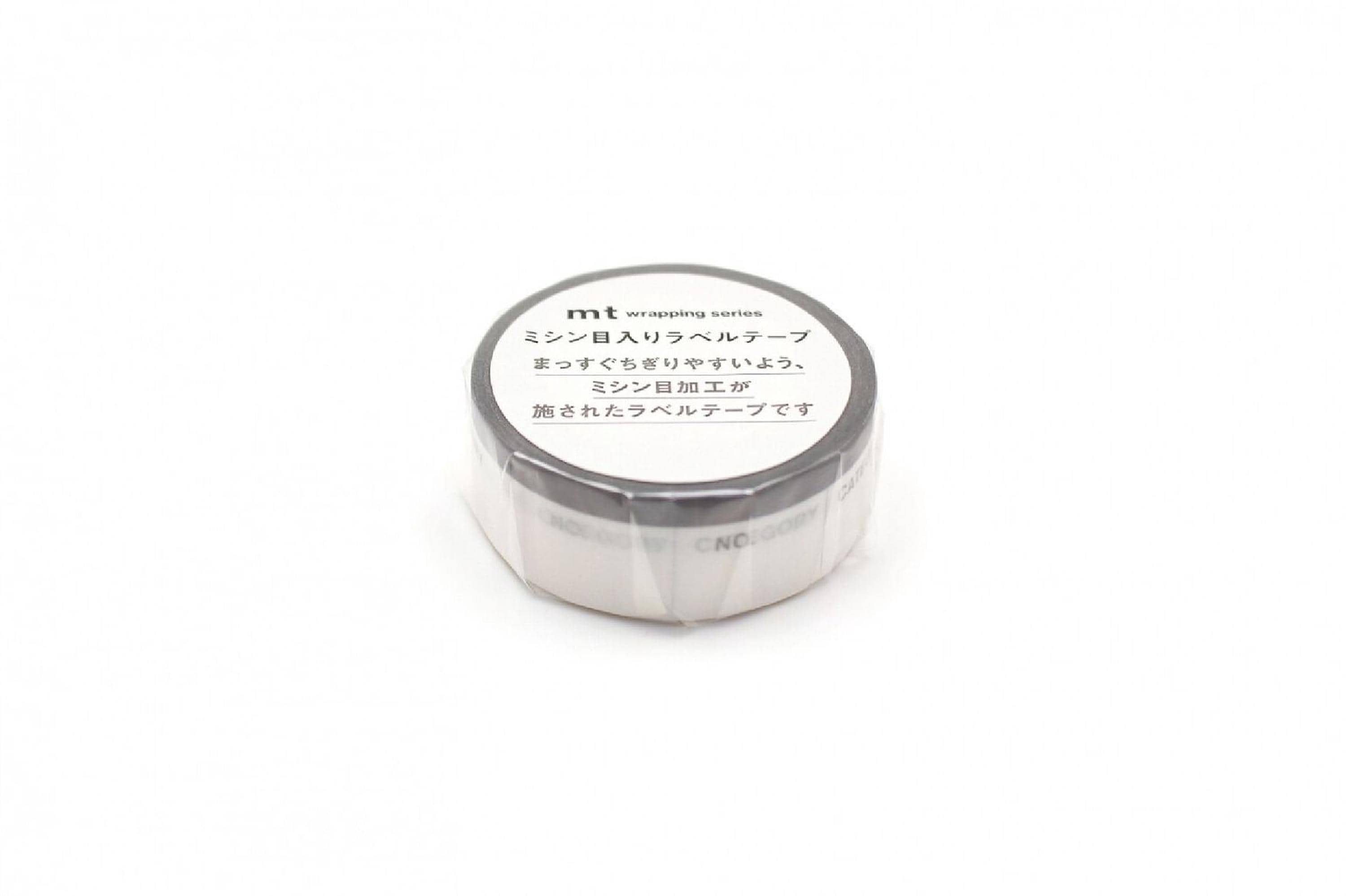 A white circular object with Japanese text on it, sitting on a white background.