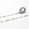 A roll of colorful birthday tape with the text "Happy Birthday" printed on it.