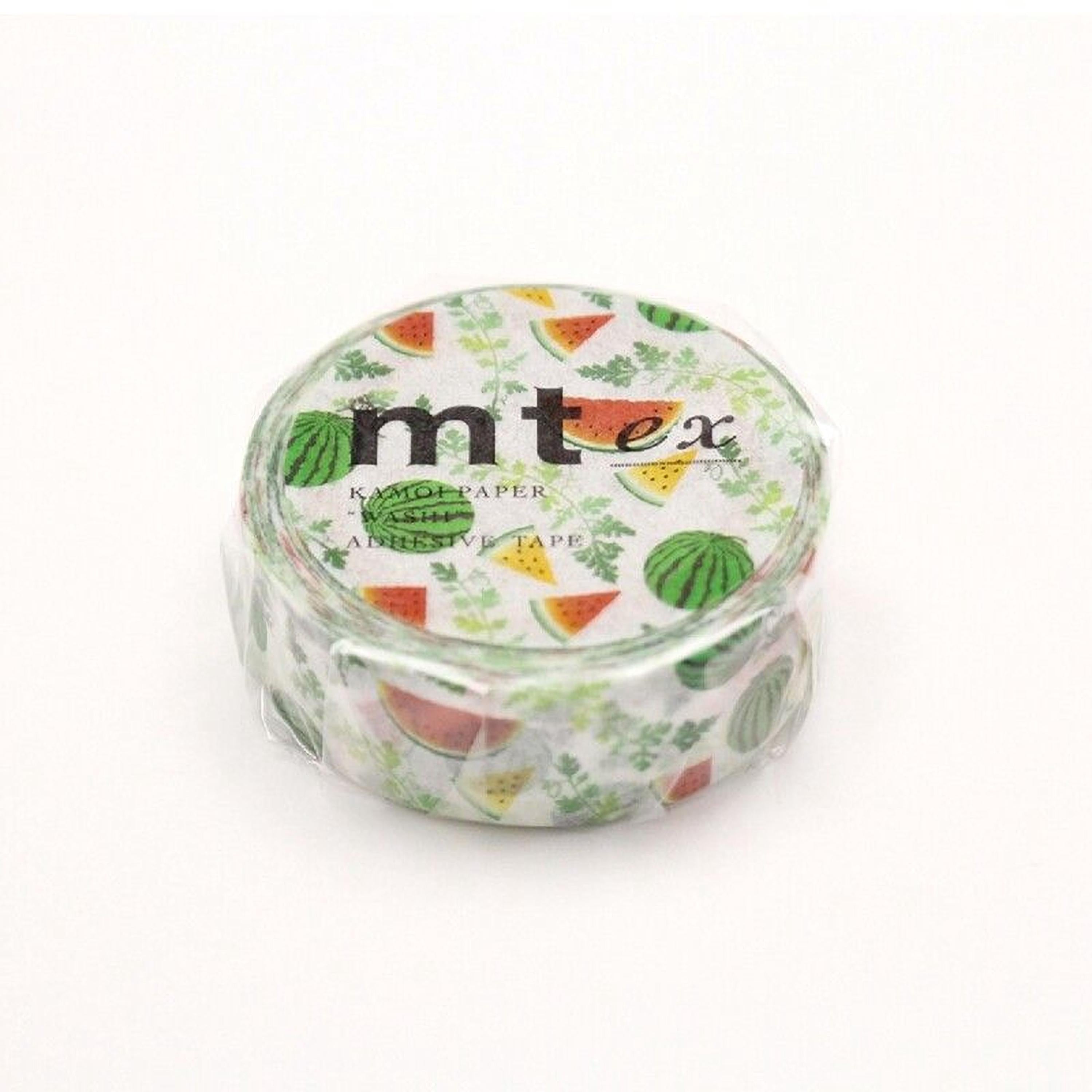 A round, white, and green tape dispenser with a pattern of watermelon slices on it.