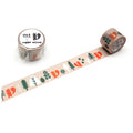 a roll of tape with a pattern of trees and animals, including squirrels, on it.