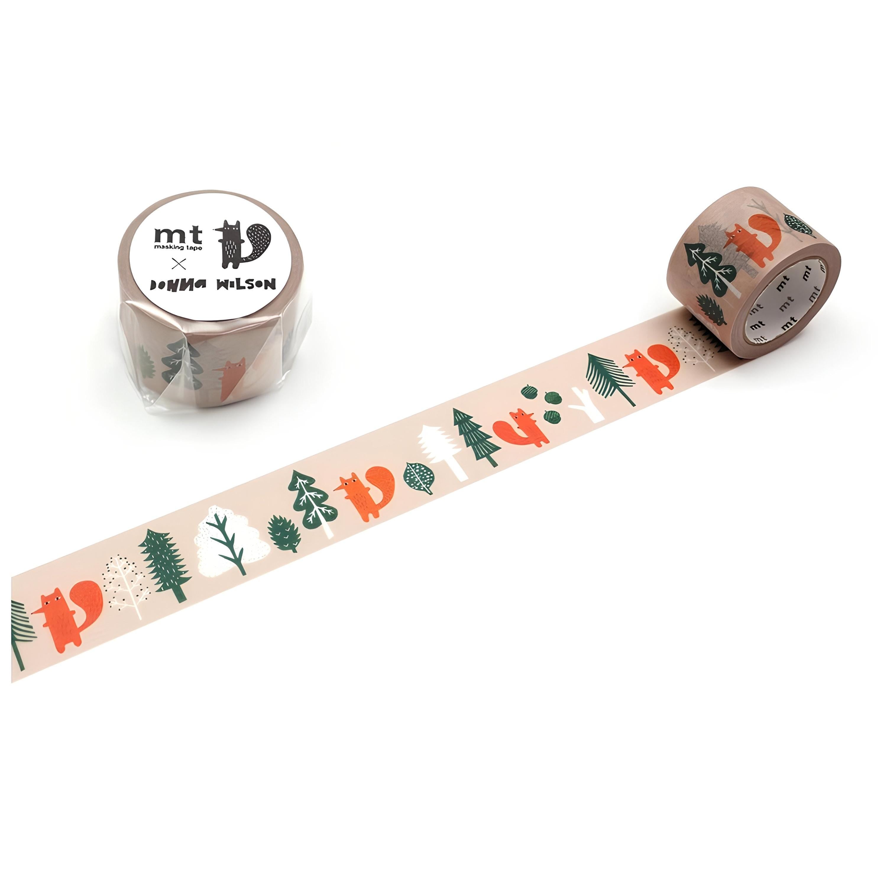 a roll of tape with a pattern of trees and animals, including squirrels, on it.