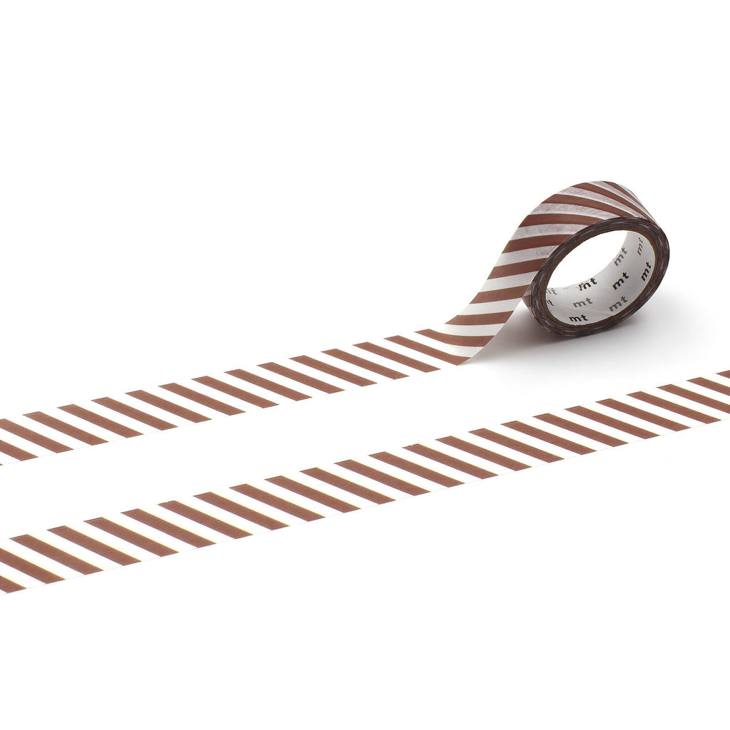 A roll of brown and white striped tape is lying on a white surface, with two parallel strips of tape visible.