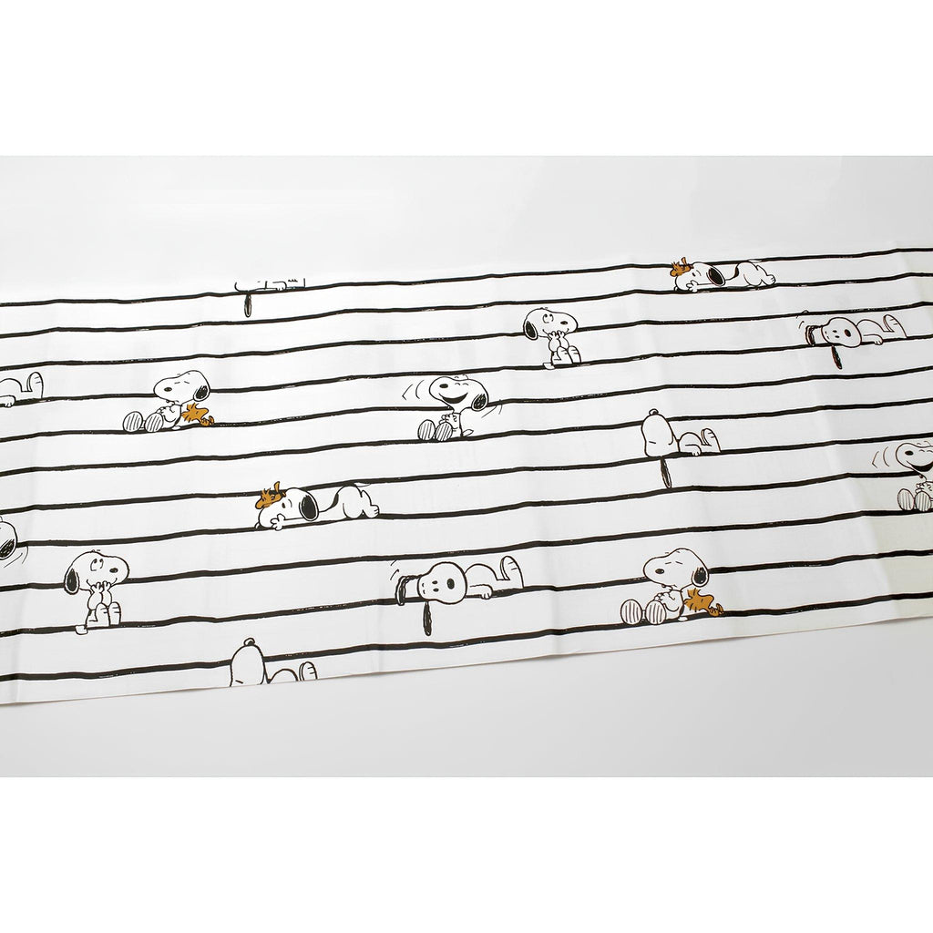 a repeating pattern of cartoon characters, including Snoopy, arranged in a grid-like layout.