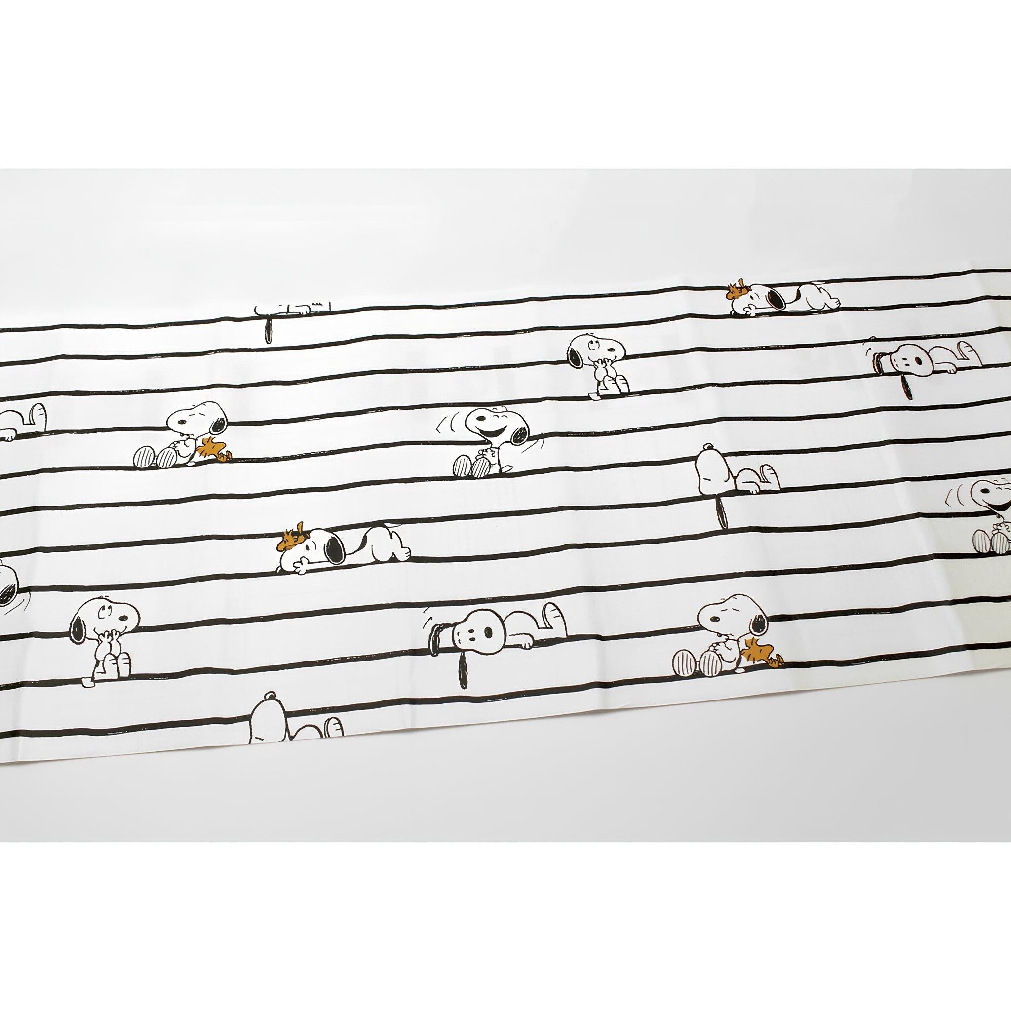 a repeating pattern of cartoon characters, including Snoopy, arranged in a grid-like layout.