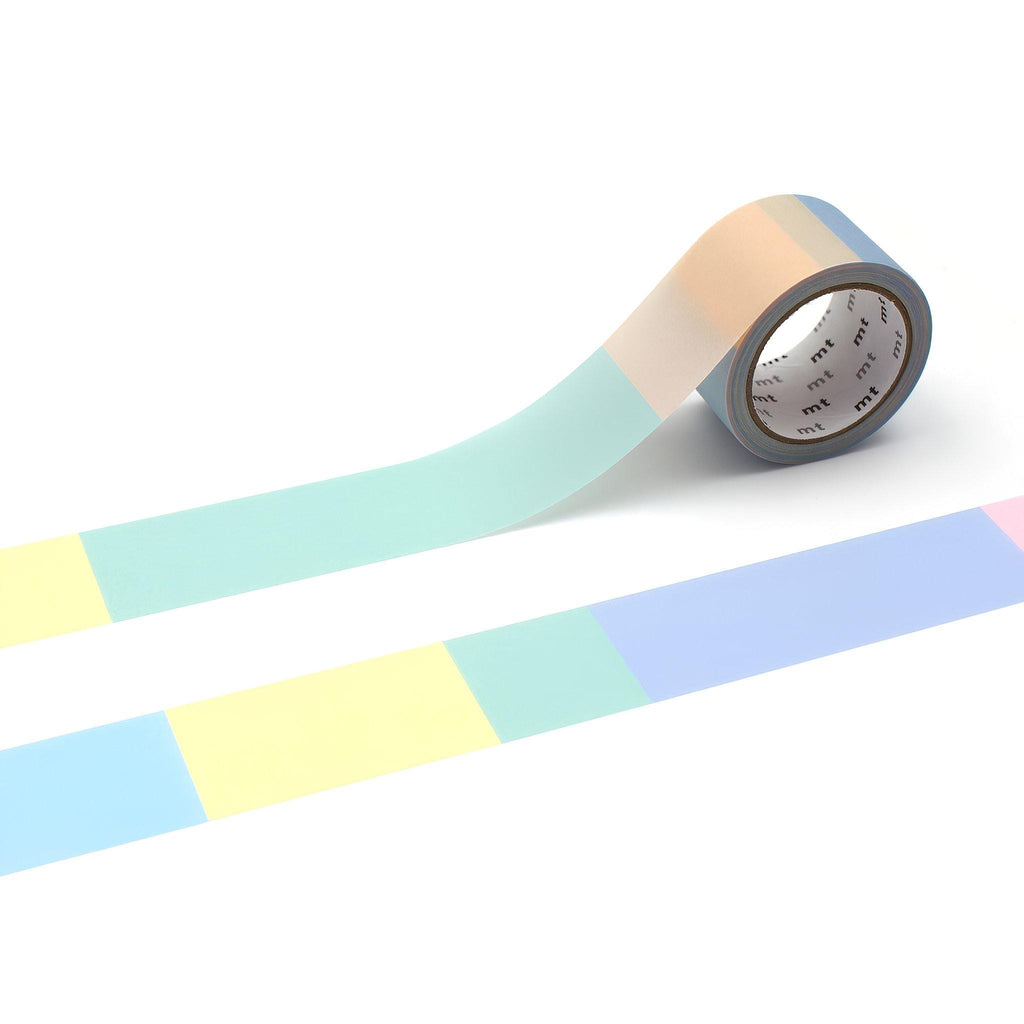 A roll of transparent tape with a pattern of pastel-colored squares on a white background.