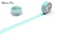 two rolls of blue and white polka dot tape on a white background.