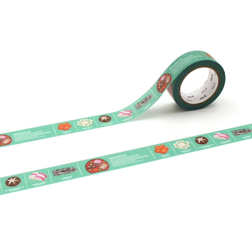 a roll of green tape with a pattern of various food items, including donuts, cookies, and other treats, arranged in a decorative manner.