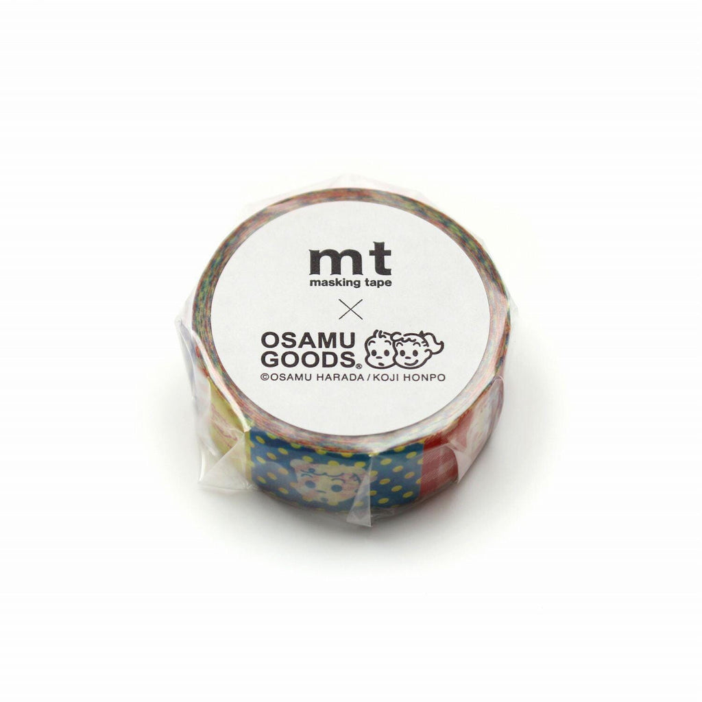 A roll of masking tape with a colorful design and text on it.