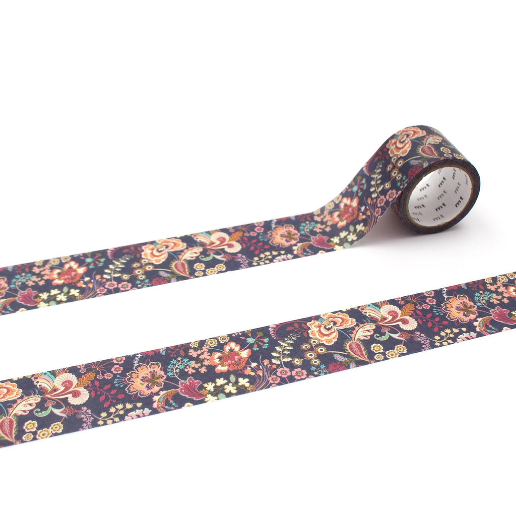 a roll of floral patterned tape with a floral design on it, placed on a white surface.