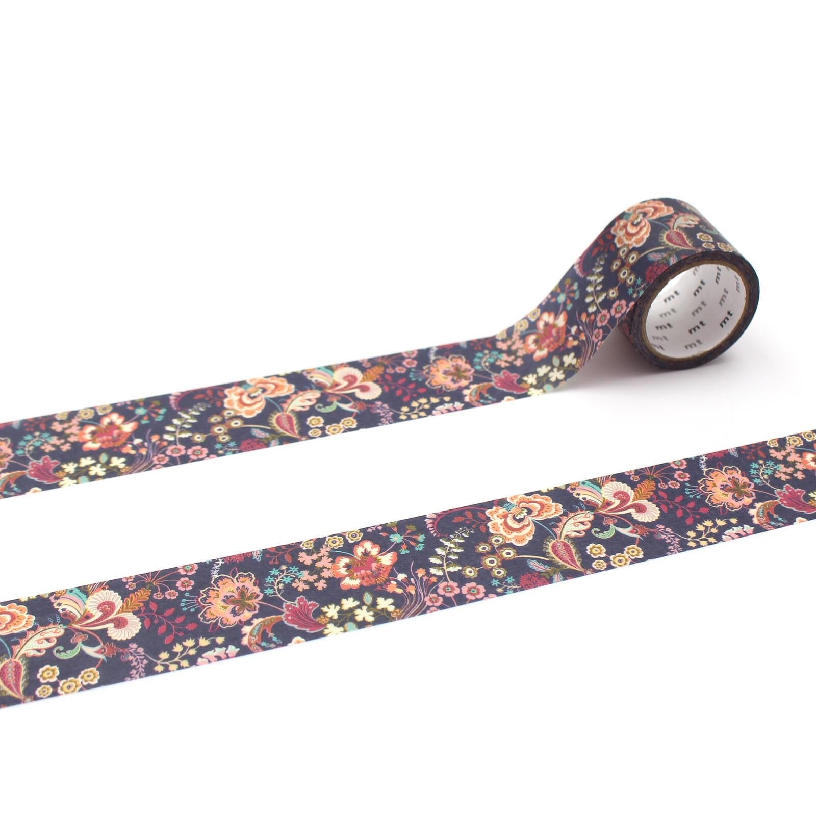a roll of floral patterned tape with a floral design on it, placed on a white surface.