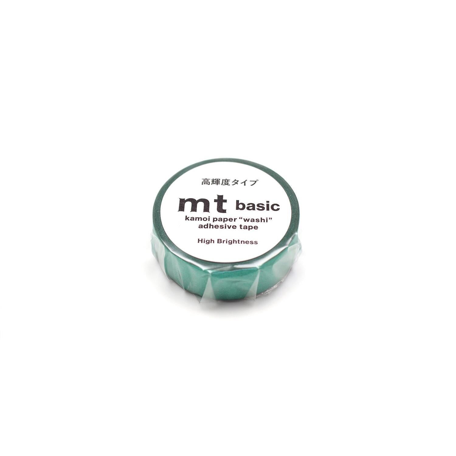 A roll of green kamol paper washi adhesive tape.