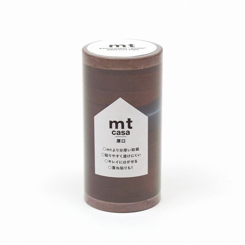 A cylindrical container with a label that reads "mt casa" and "招商" (Product).