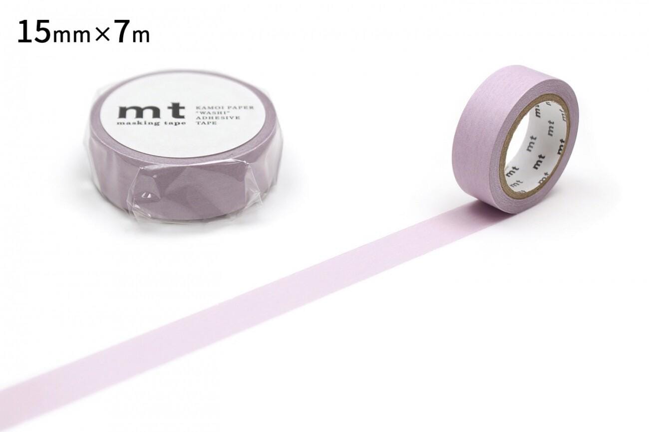 a roll of pink masking tape and a single roll of the same tape, both lying on a white background.