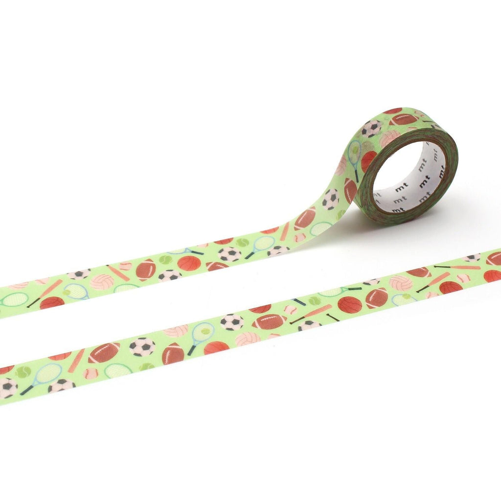A roll of green tape with a pattern of sports balls and other objects printed on it.