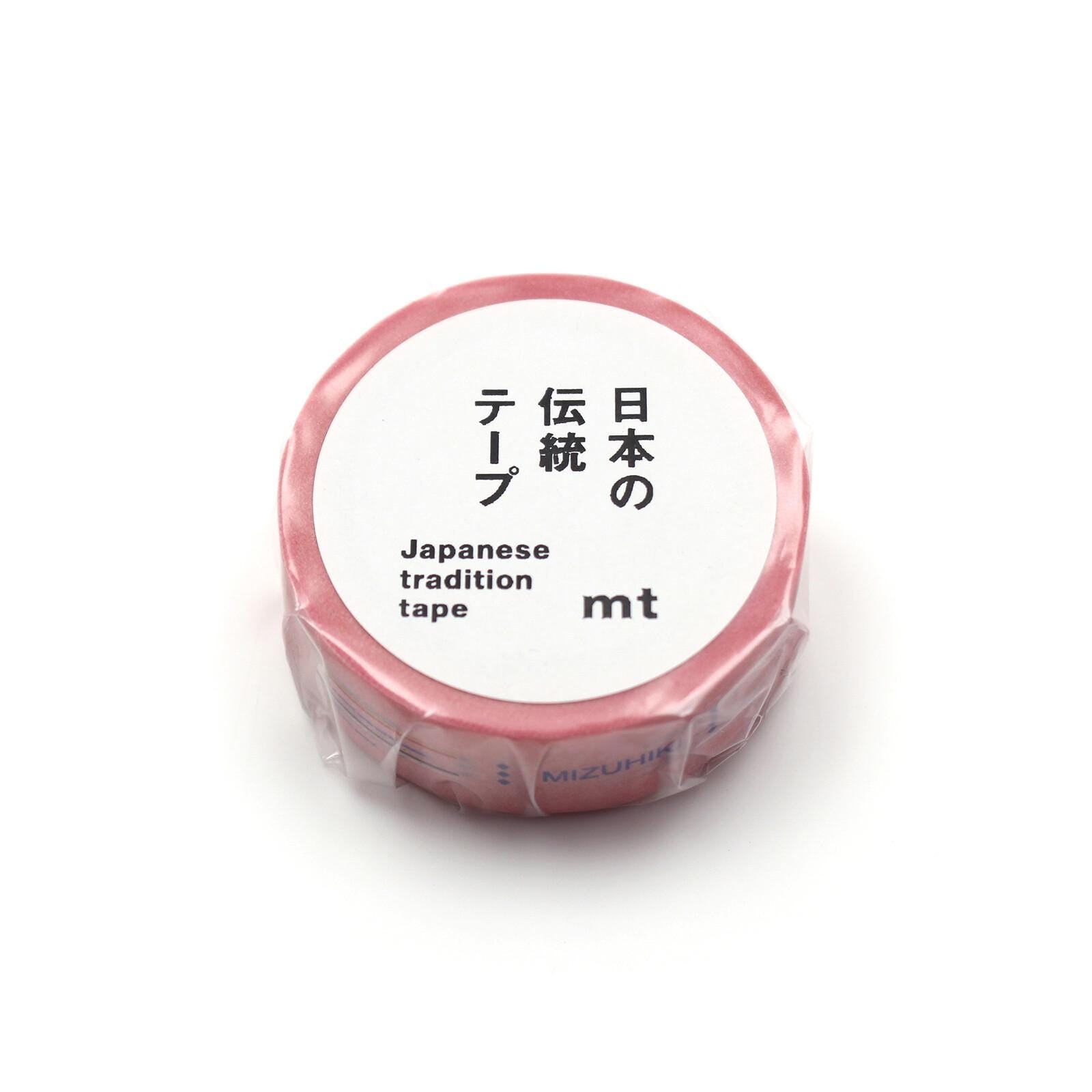 A pink roll of Japanese tradition tape with black text on a white background.