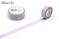 a roll of purple masking tape and a single roll of the same tape, both lying on a white background.