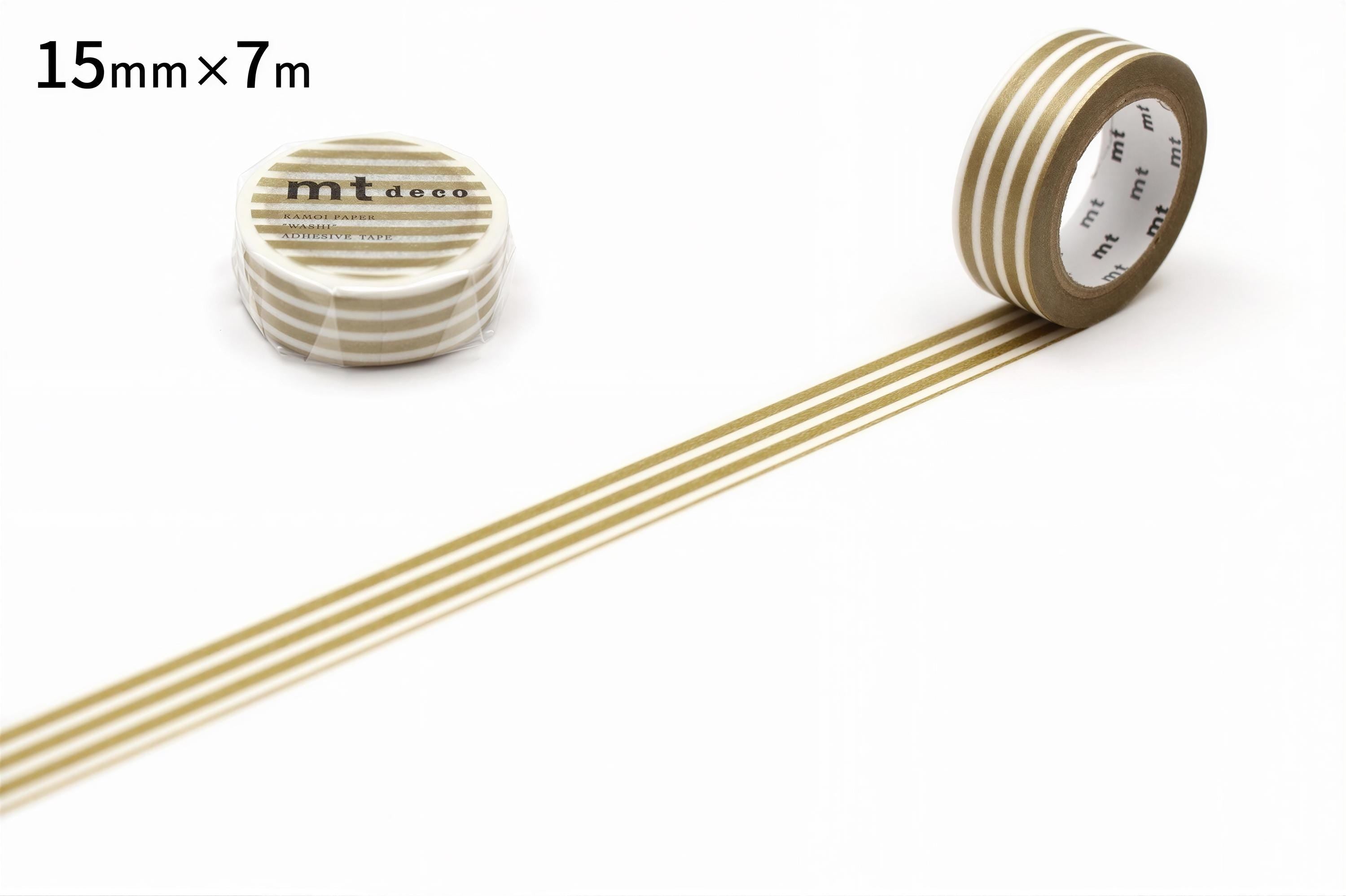 a roll of gold and white striped tape with a label, and a single roll of tape on a white background.