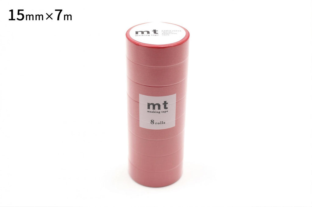 A stack of pink rolls of masking tape, with a label indicating the size and quantity.