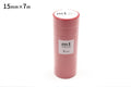 A stack of pink rolls of masking tape, with a label indicating the size and quantity.