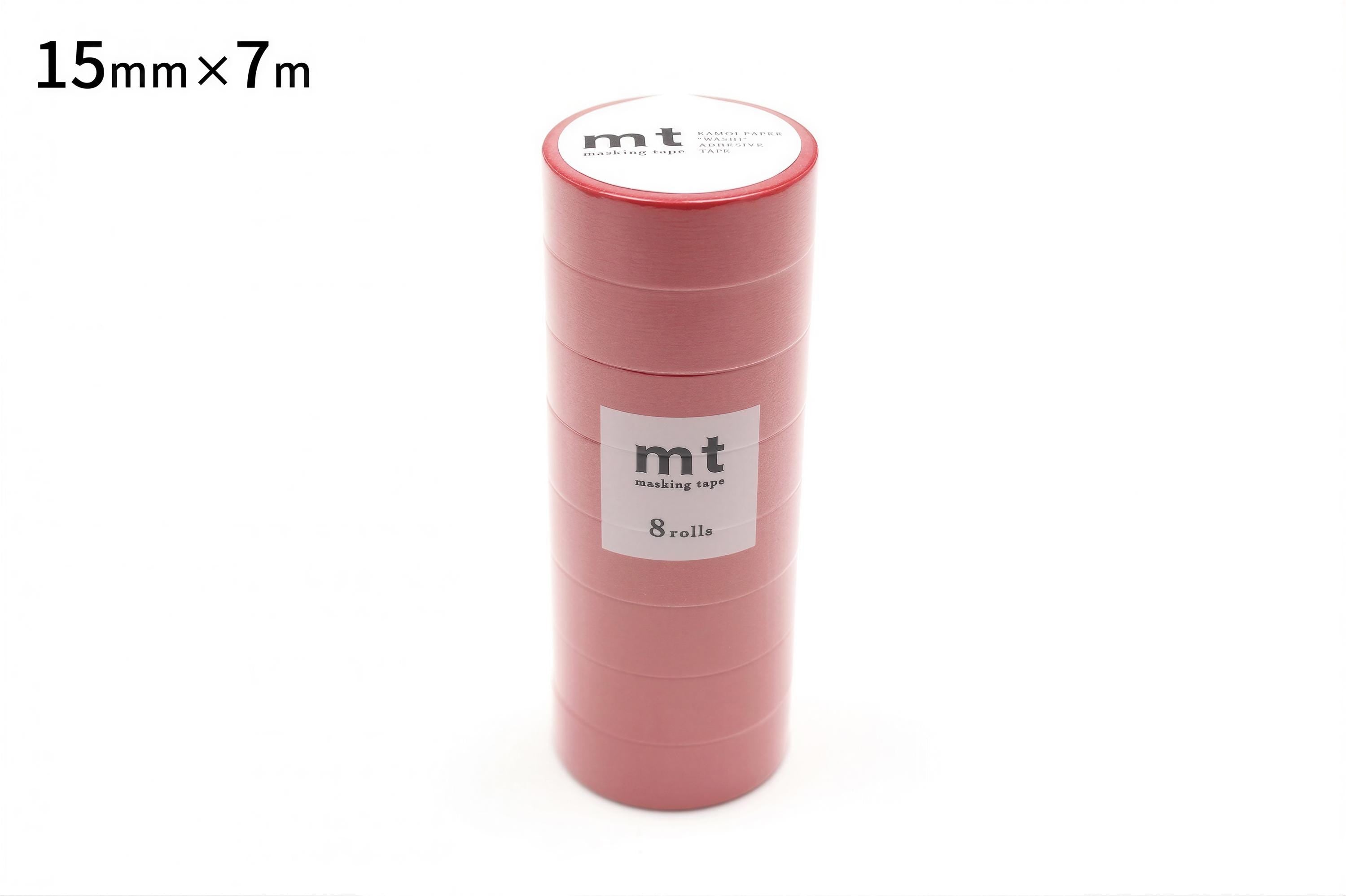 A stack of pink rolls of masking tape, with a label indicating the size and quantity.