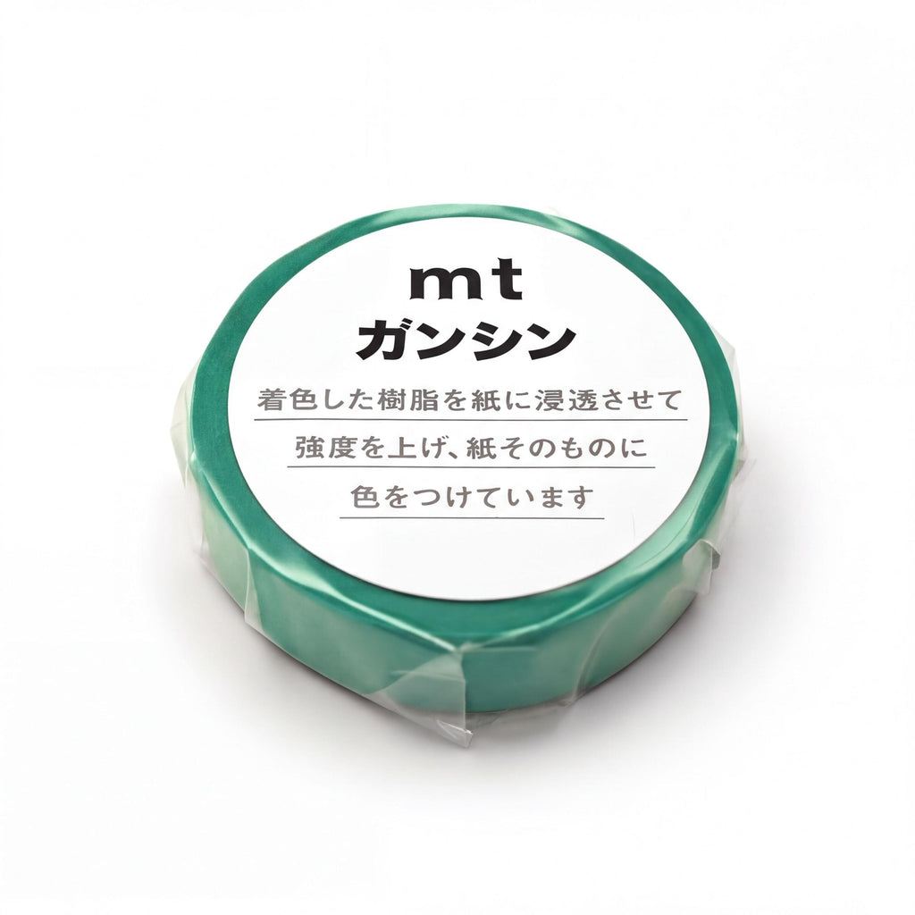 A green circular object with Japanese text on it.