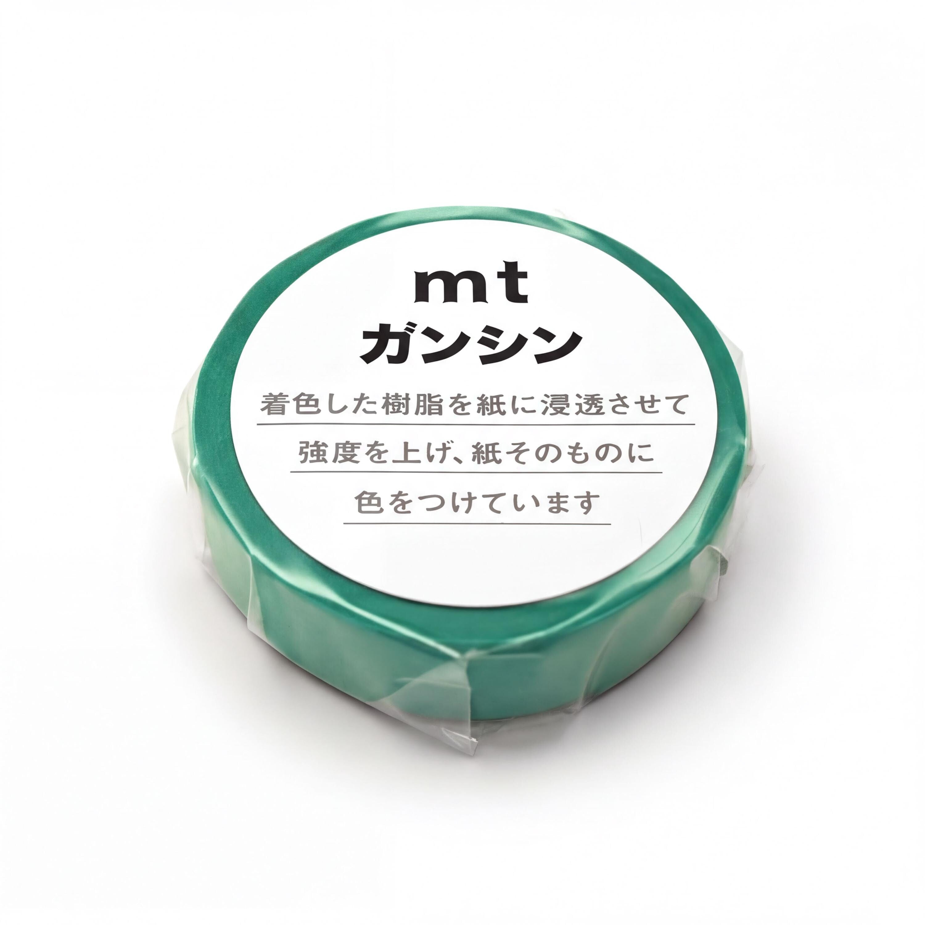 A green circular object with Japanese text on it.