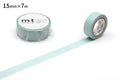 a roll of light blue masking tape and a single roll of the same tape, both lying on a white background.