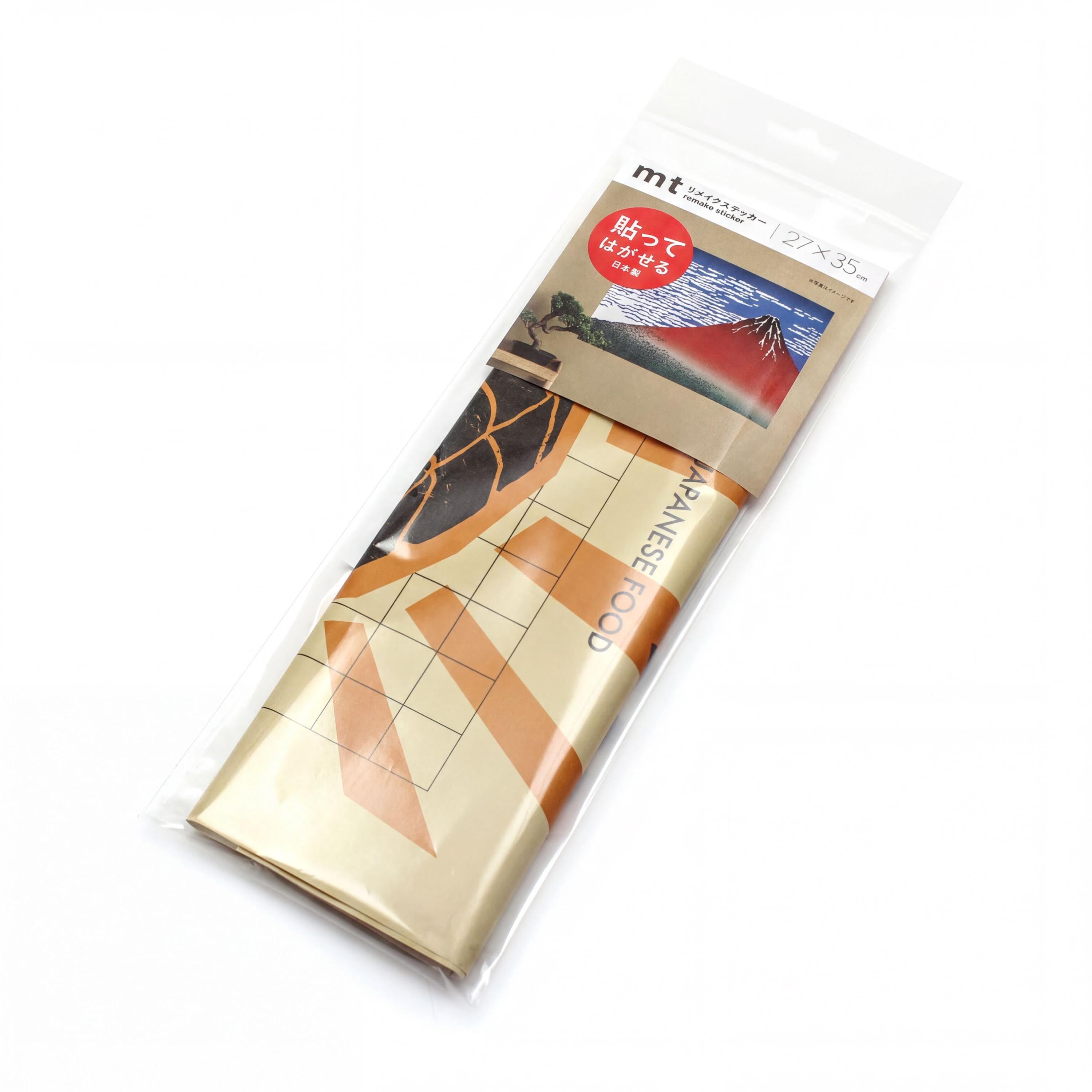 A package containing a printed image of a mountain landscape, likely a Japanese-style artwork.