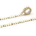 a roll of yellow and white patterned tape with a repeating design of people in various poses.