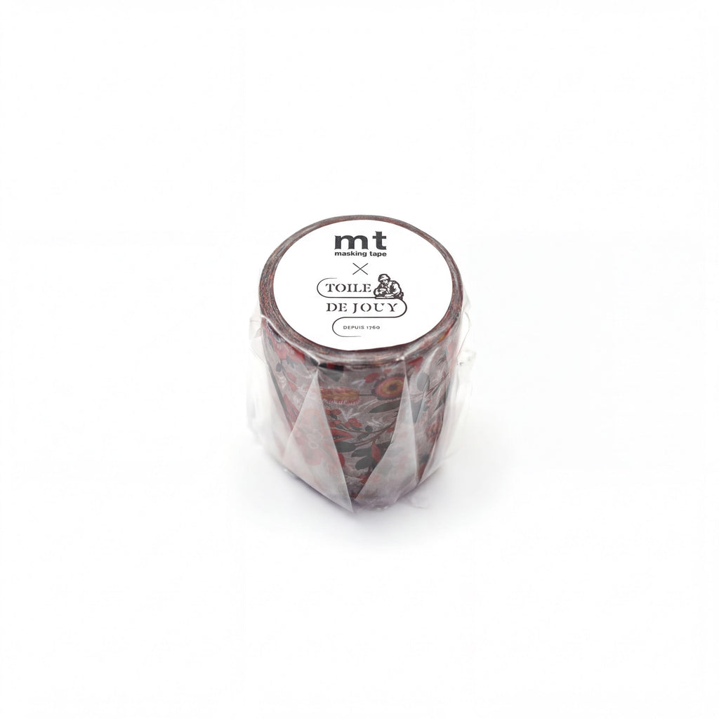 A cylindrical container with a label that reads "mt masking tape TOIL & DE JOYY DEPUIS 1970".