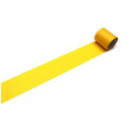 A roll of yellow tape is lying on its side on a white background.