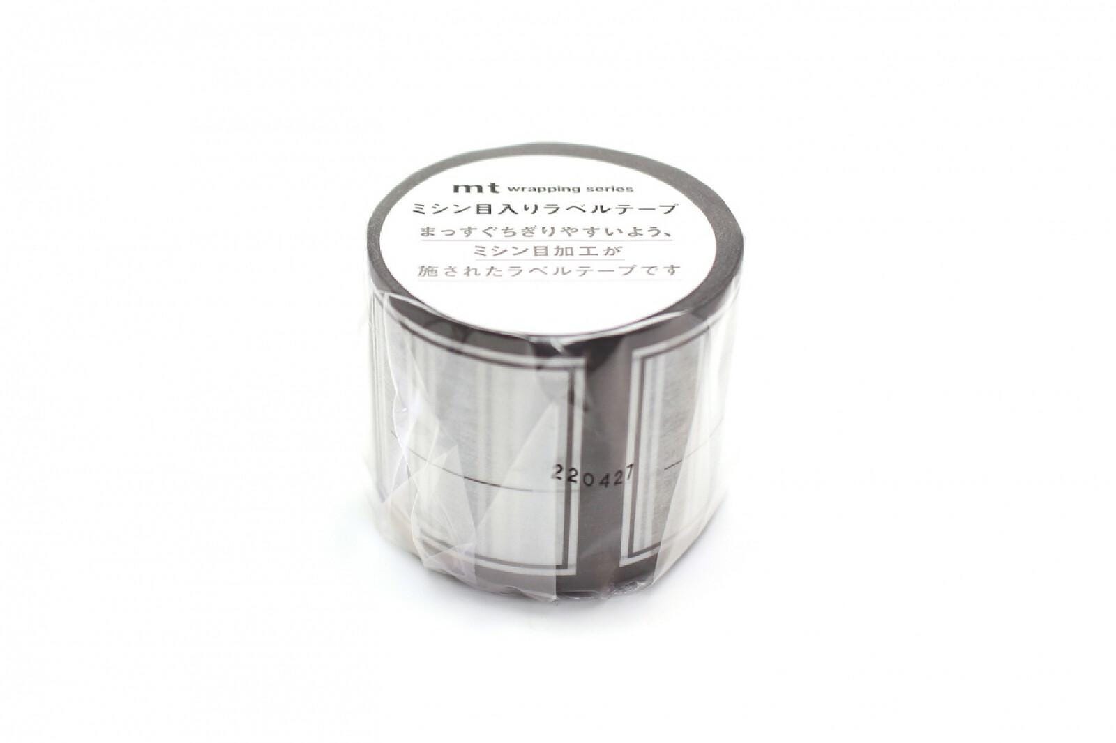 A cylindrical object wrapped in plastic, with Japanese text on the label.