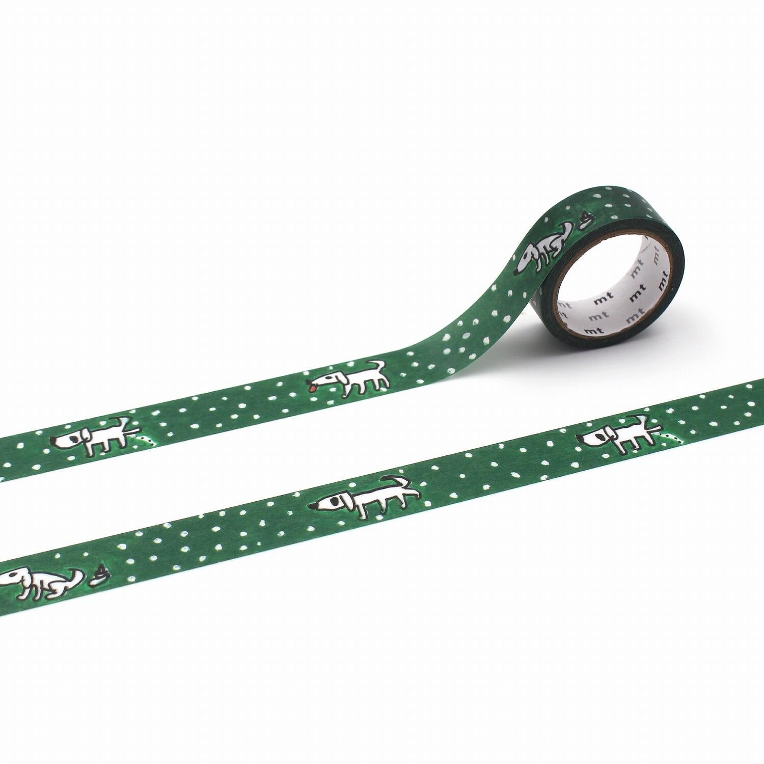a roll of green and white polka dot tape with a pattern of small white dots and a small white dog on it.