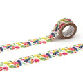 a roll of colorful patterned tape with a vibrant design of multicolored shapes and lines.