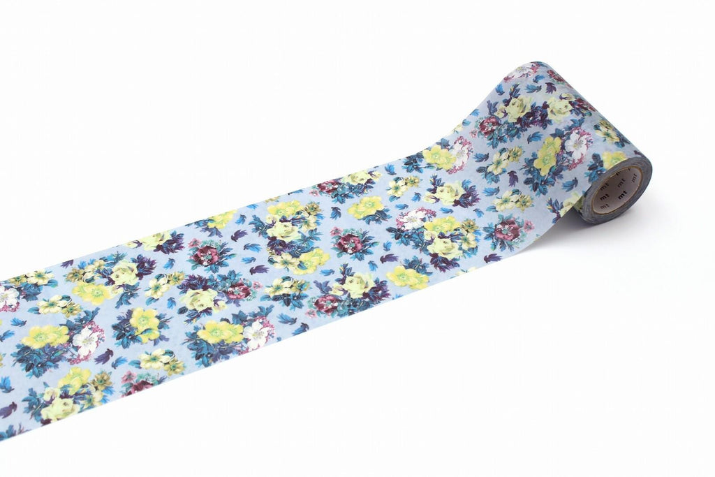 A roll of floral patterned tape is shown against a white background.