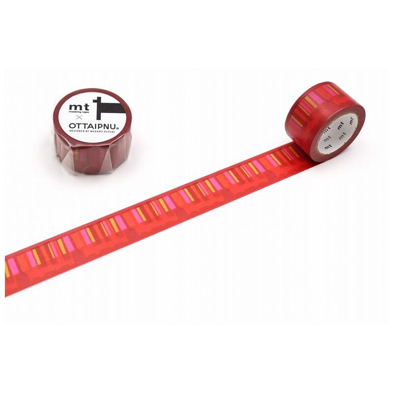 a roll of red and pink patterned tape lying on its side on a white background.