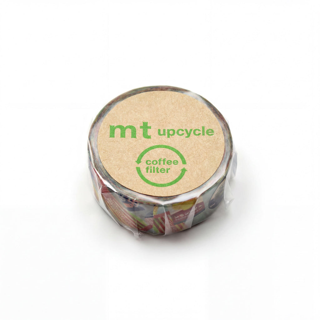 A circular object with a label that says "mt upcycle coffee filter" on it.