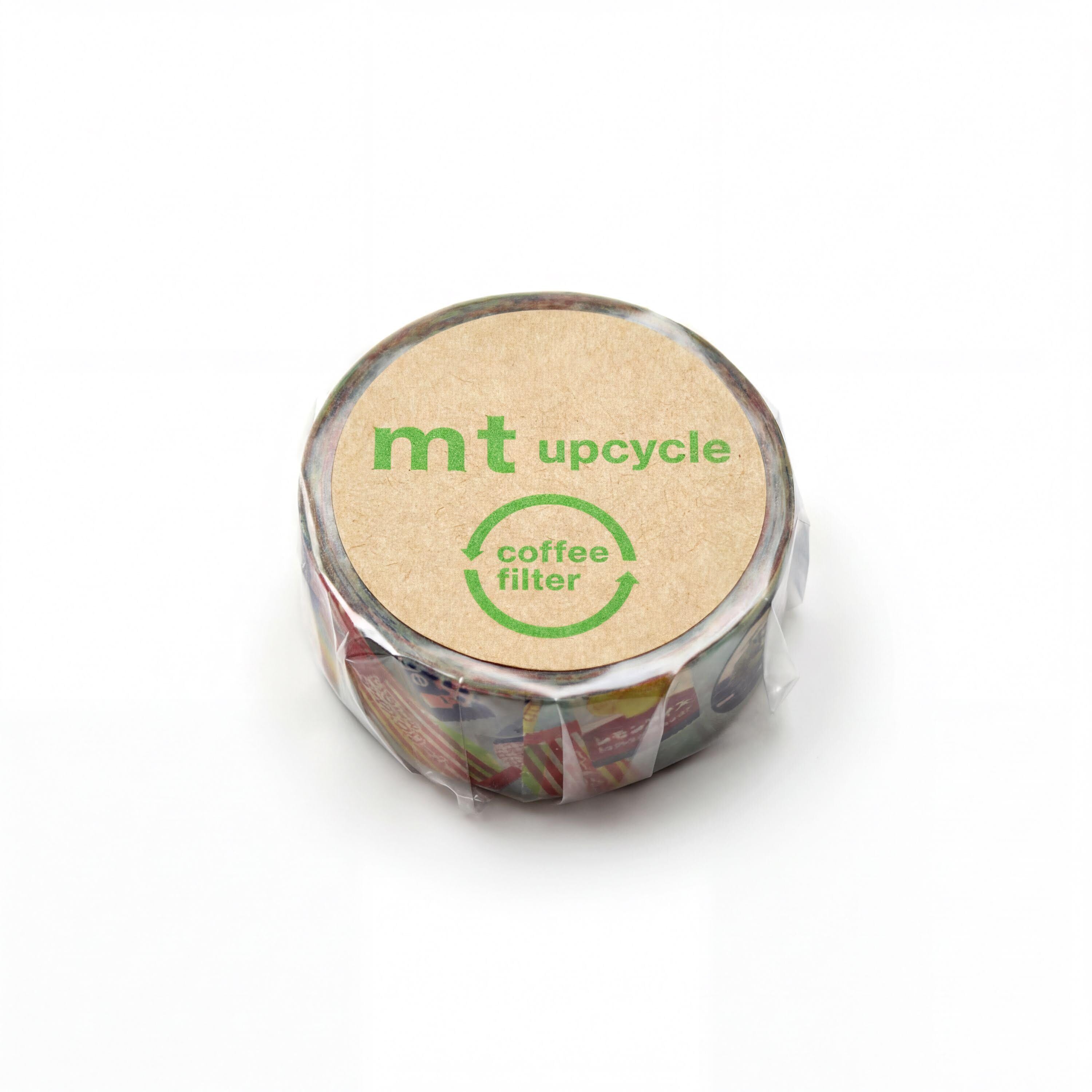 A circular object with a label that says "mt upcycle coffee filter" on it.