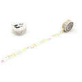 a roll of colorful patterned tape and a small container with a cherry design on it, both placed on a white background.