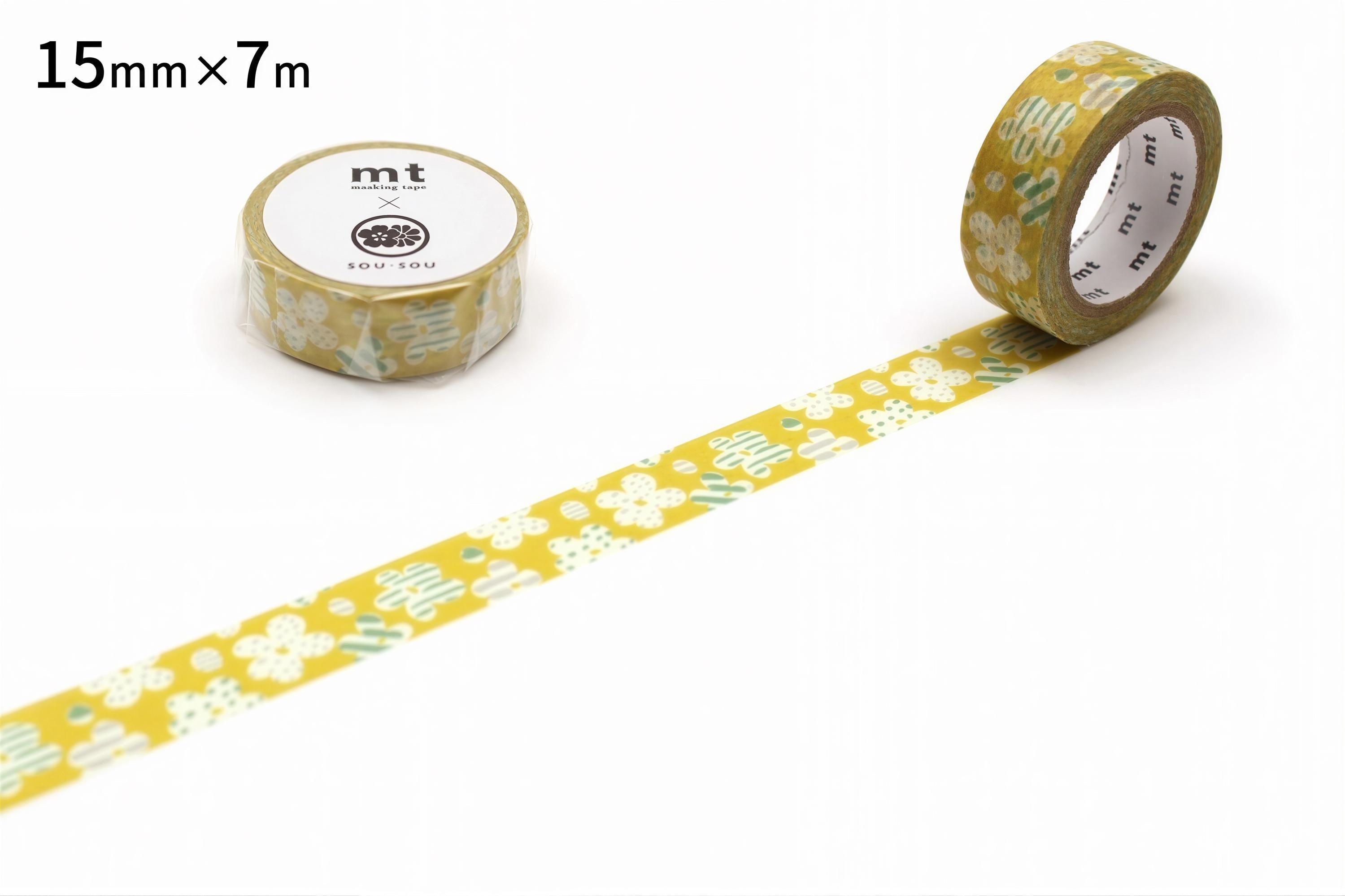 a roll of yellow and green floral patterned tape and a single roll of tape on a white background.