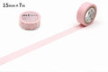 two rolls of pink and white checkered tape on a white background.