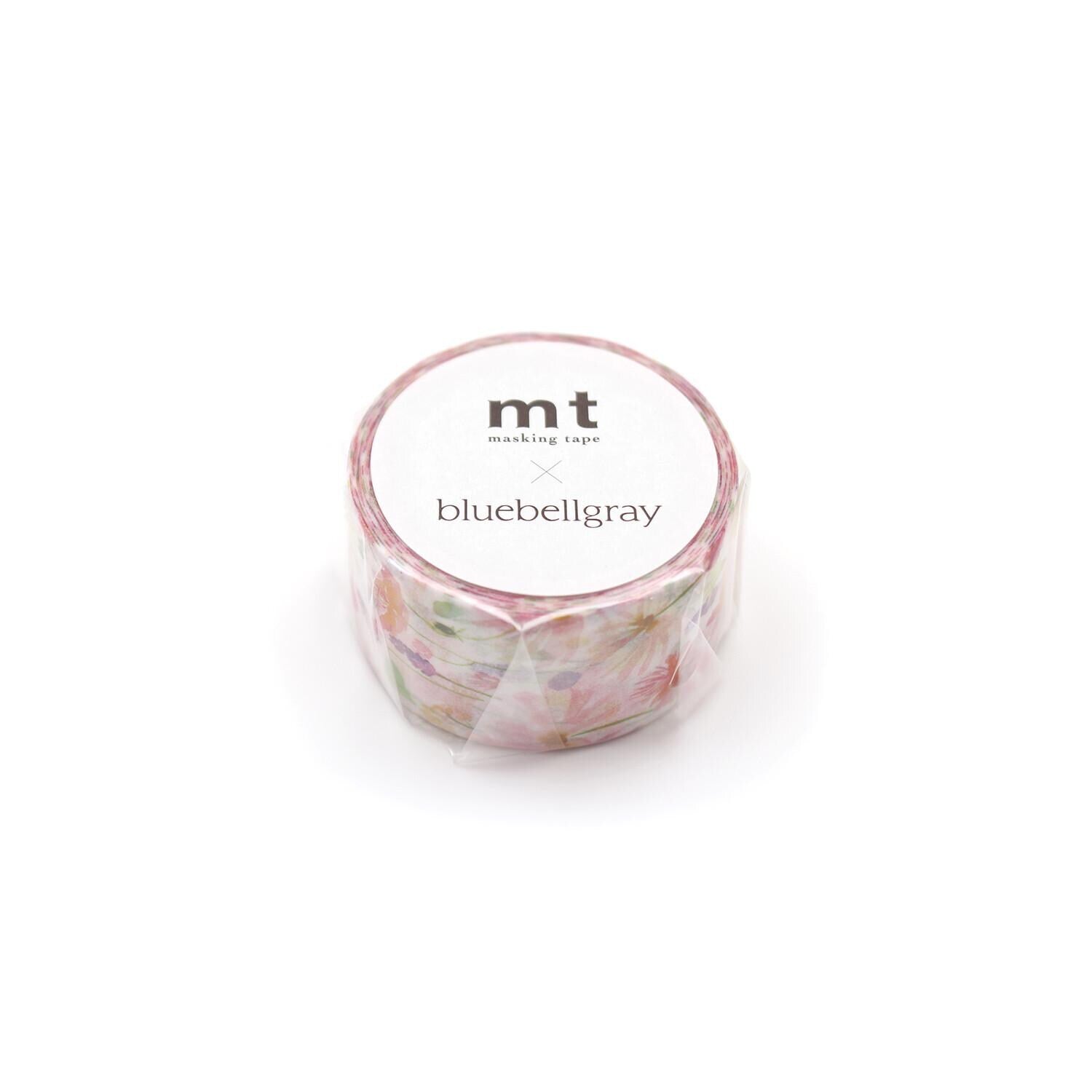 A roll of floral patterned tape with the brand name "mt" printed on it.