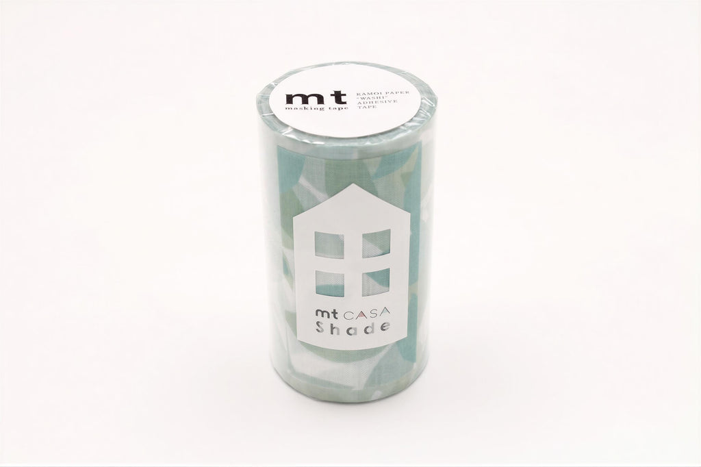 A cylindrical container with a label that reads "mt CASA Shade" and a house-shaped design on it.