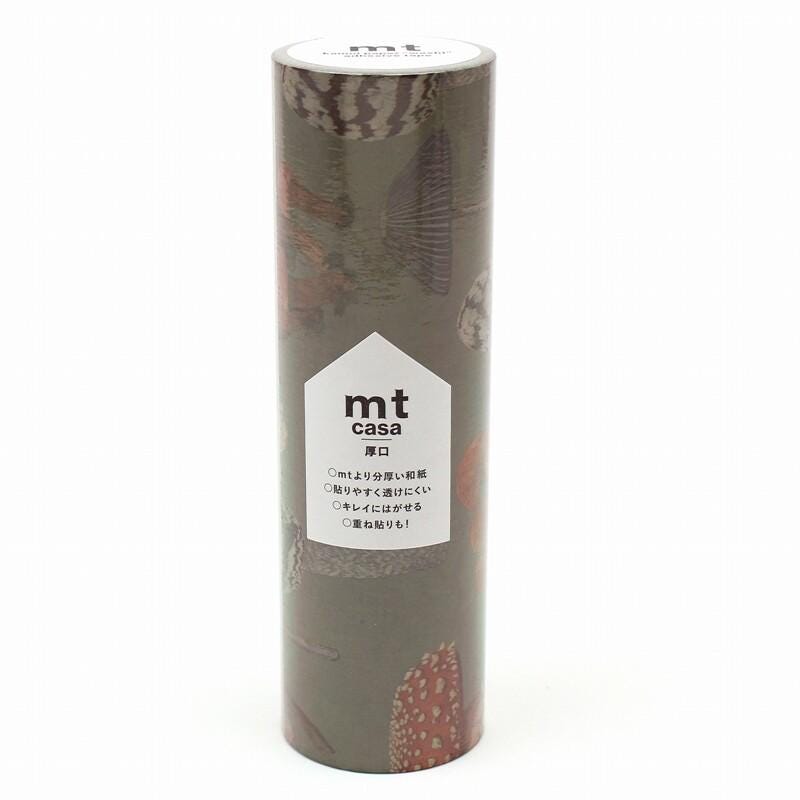 A cylindrical container with a patterned design on it, featuring the text "mt casa" and some Japanese text.