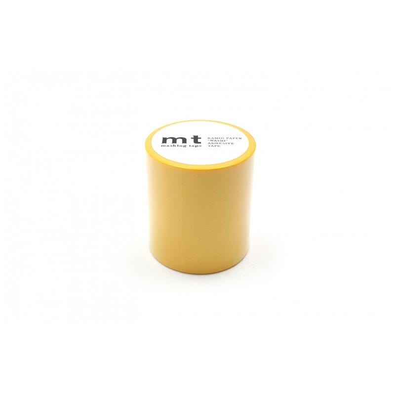 A cylindrical object with a yellow exterior and a white label on it, set against a white background.